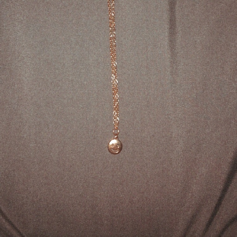 :) smiley face charm with fake golden chain